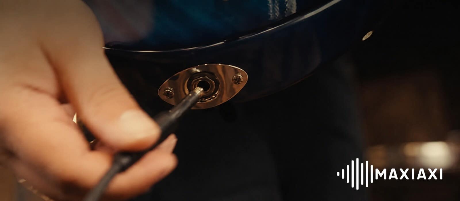Kan je een koptelefoon aansluiten op een elektrische gitaar?