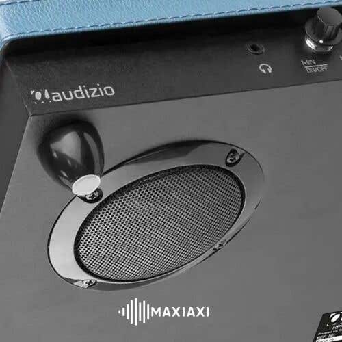 Close up van de ingebouwde speakers van een vinyl speler